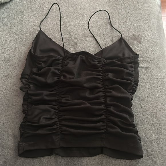 Garage tank top that is mesh and see through, shown in last pic. - Picture 3 of 4